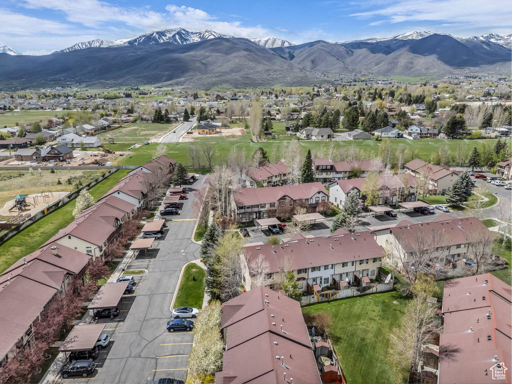 Drone / aerial view with a mountain view and a residential view