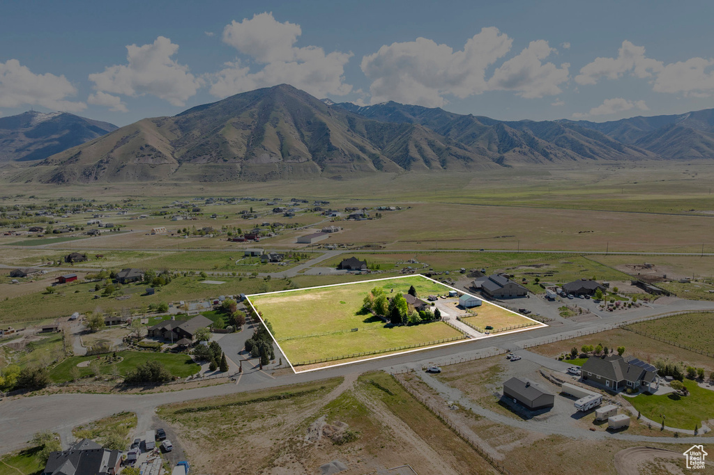 Birds eye view of property featuring a rural view
