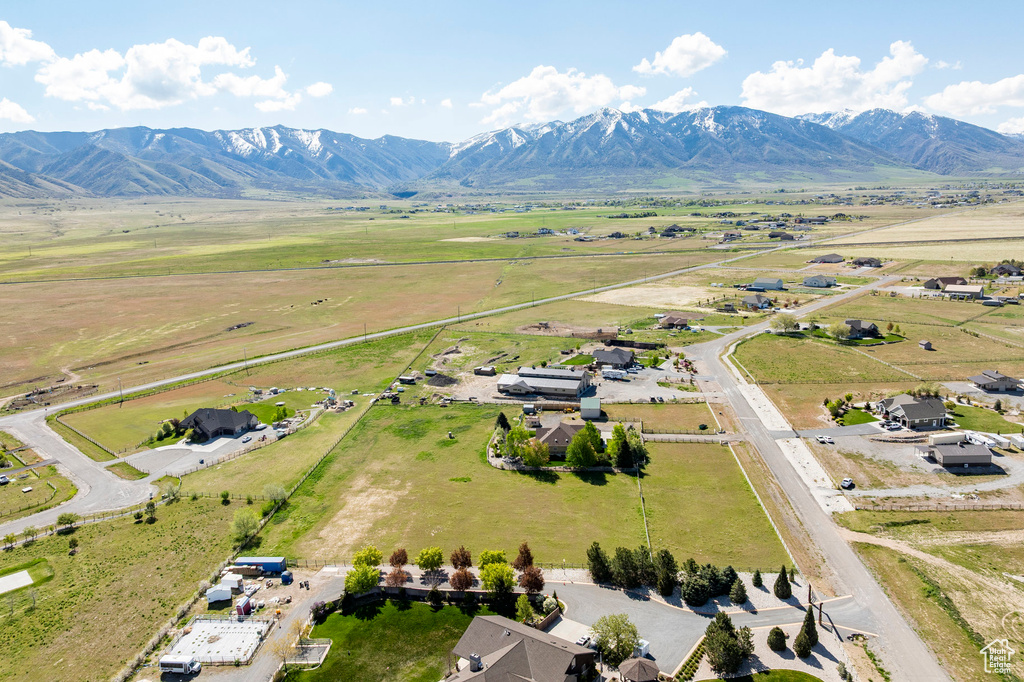 Aerial view featuring a rural view and a mountain view