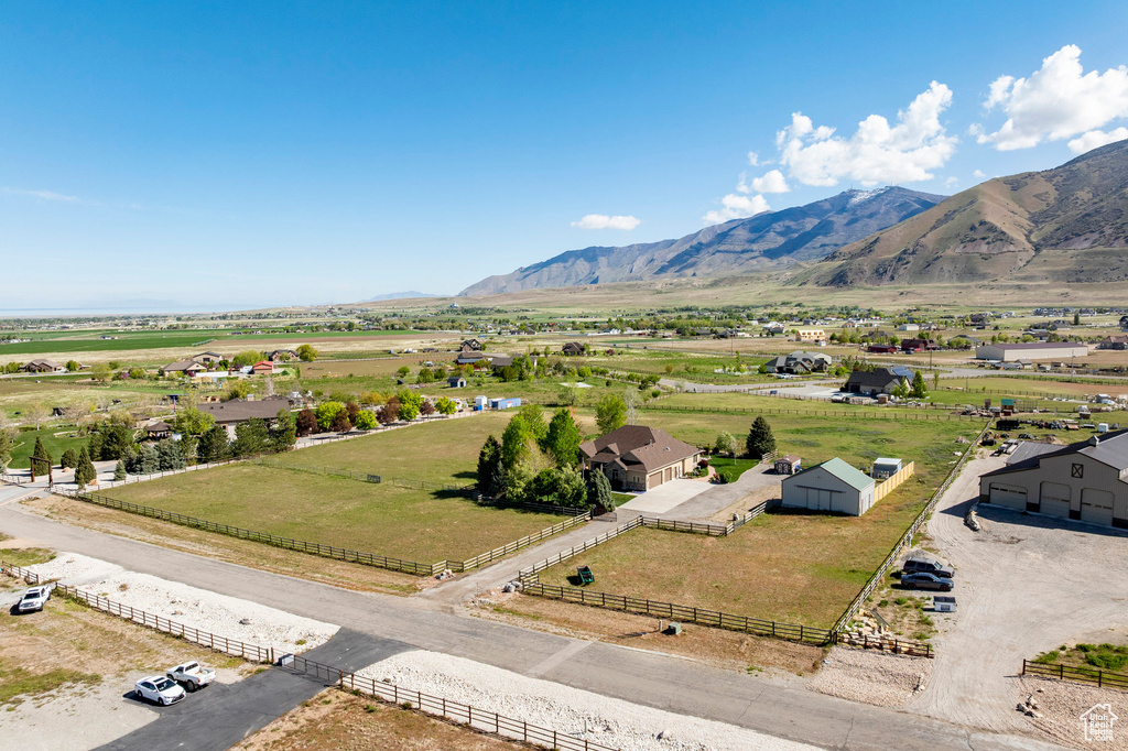 Drone / aerial view with a mountain view and a rural view