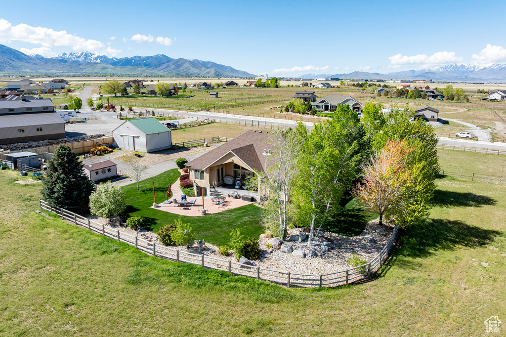 Birds eye view of property featuring a mountain view and a rural view