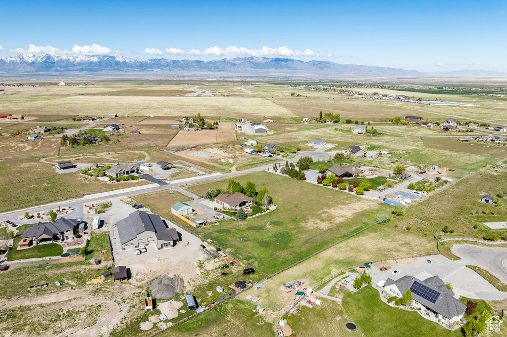 Drone / aerial view with a residential view and a mountain view