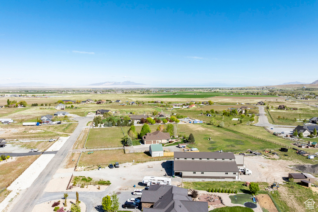 Birds eye view of property with a mountain view