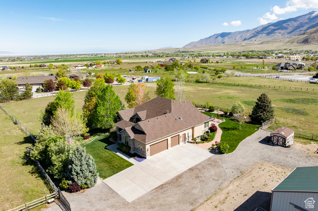 Drone / aerial view with a mountain view and a rural view