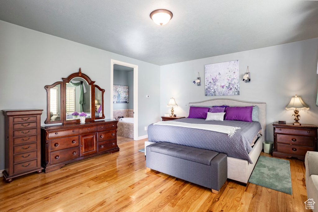 Bedroom with light wood finished floors