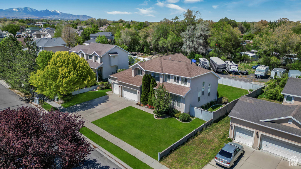Aerial view featuring a mountain view and a residential view