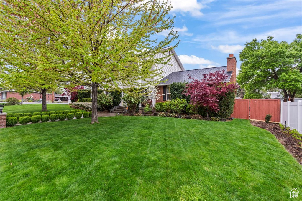 View of yard with fence