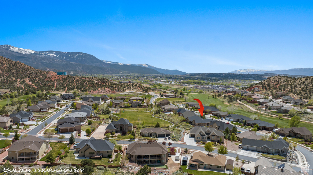 Birds eye view of property featuring a residential view and a mountain view