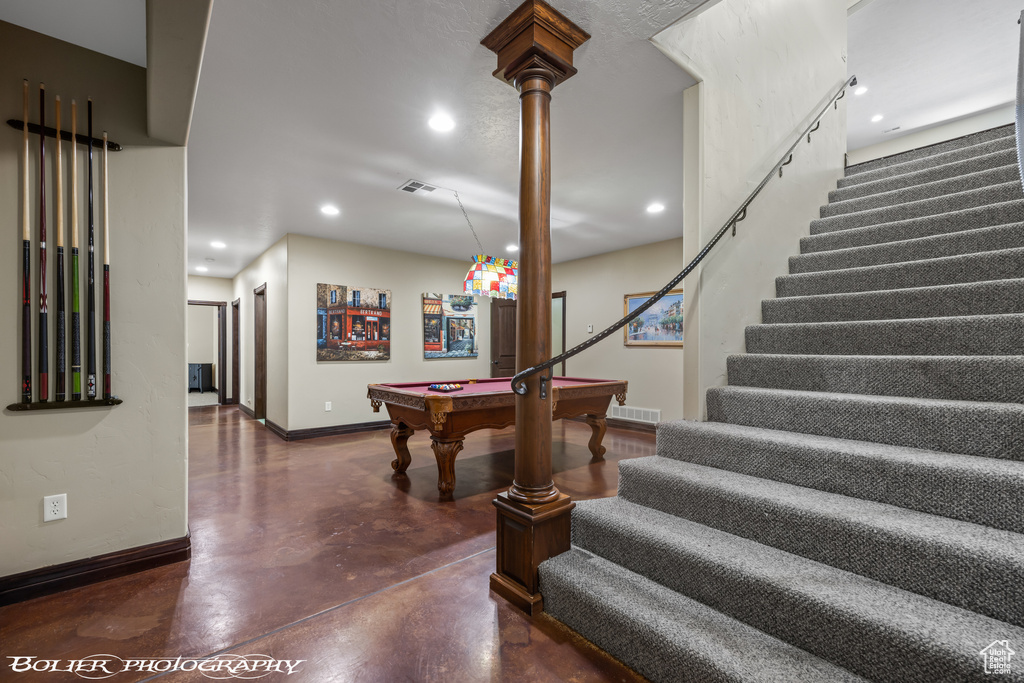 Recreation room featuring finished concrete floors, billiards, baseboards, and recessed lighting