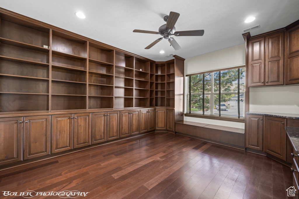 Interior space with recessed lighting, ceiling fan, dark wood-style floors, and visible vents