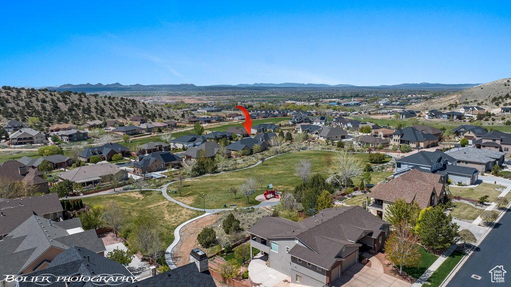 Birds eye view of property featuring a residential view and a mountain view