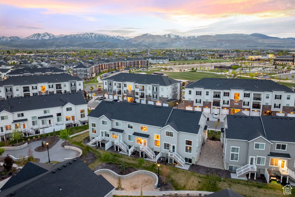 Aerial view at dusk with a residential view and a mountain view