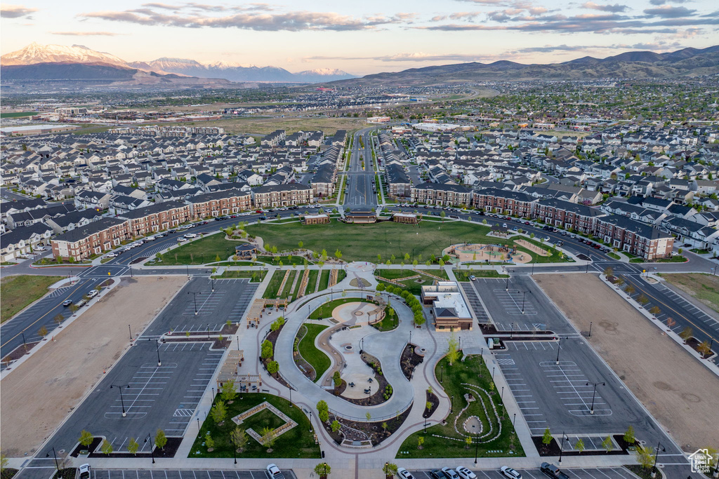 Aerial view at dusk featuring a mountain view