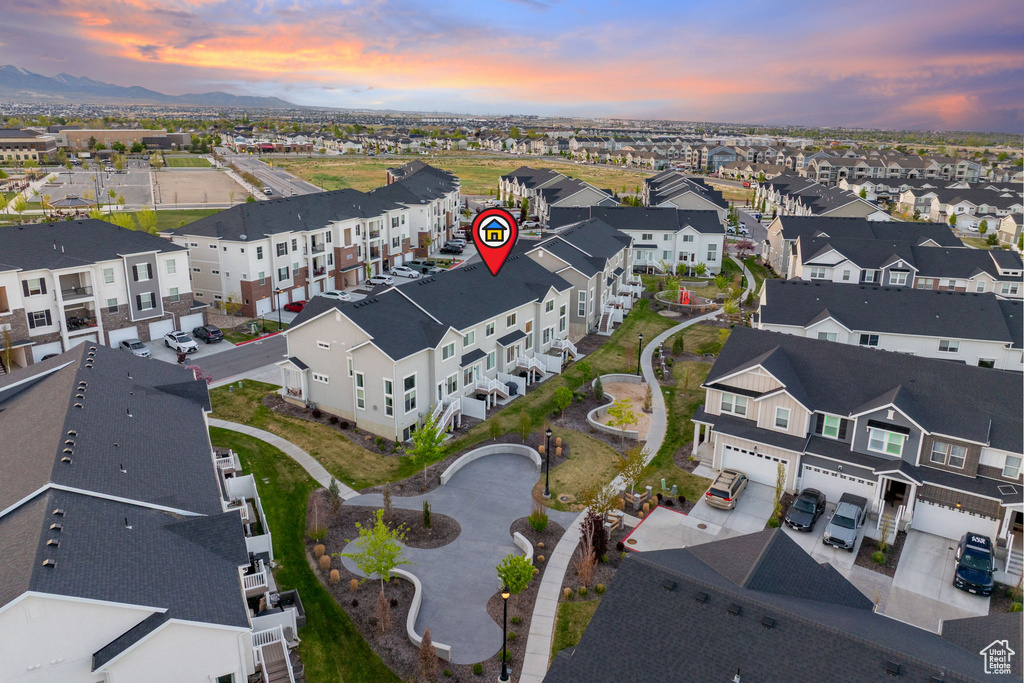 Aerial view at dusk with a mountain view and a residential view