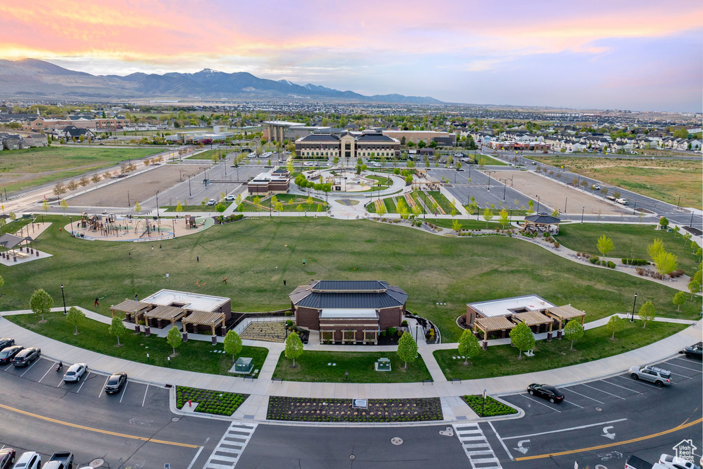 Aerial view at dusk featuring a mountain view