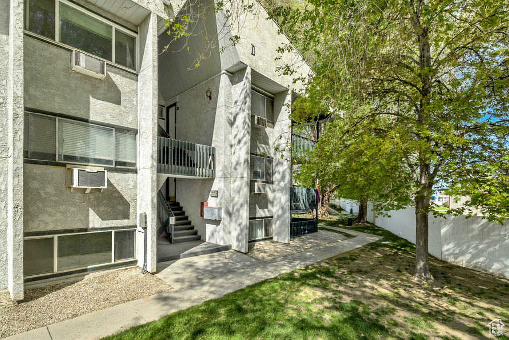 View of property with stairway