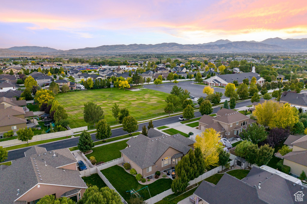 Drone / aerial view featuring a mountain view and a residential view
