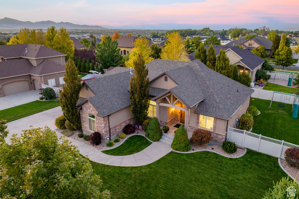 Birds eye view of property with a residential view and a mountain view