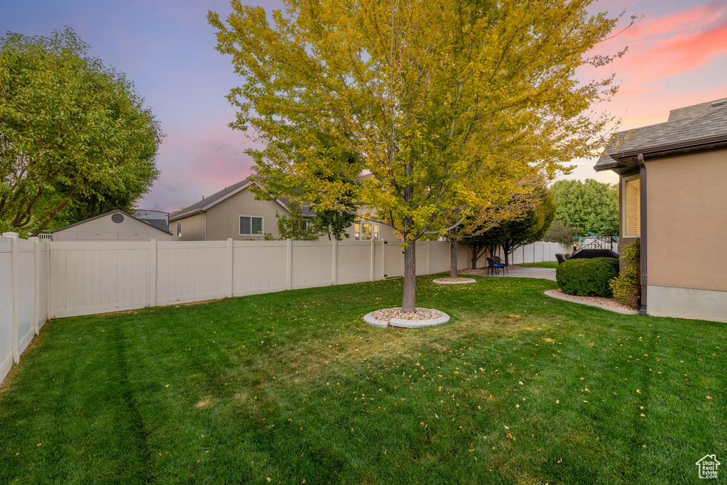 View of yard with a fenced backyard