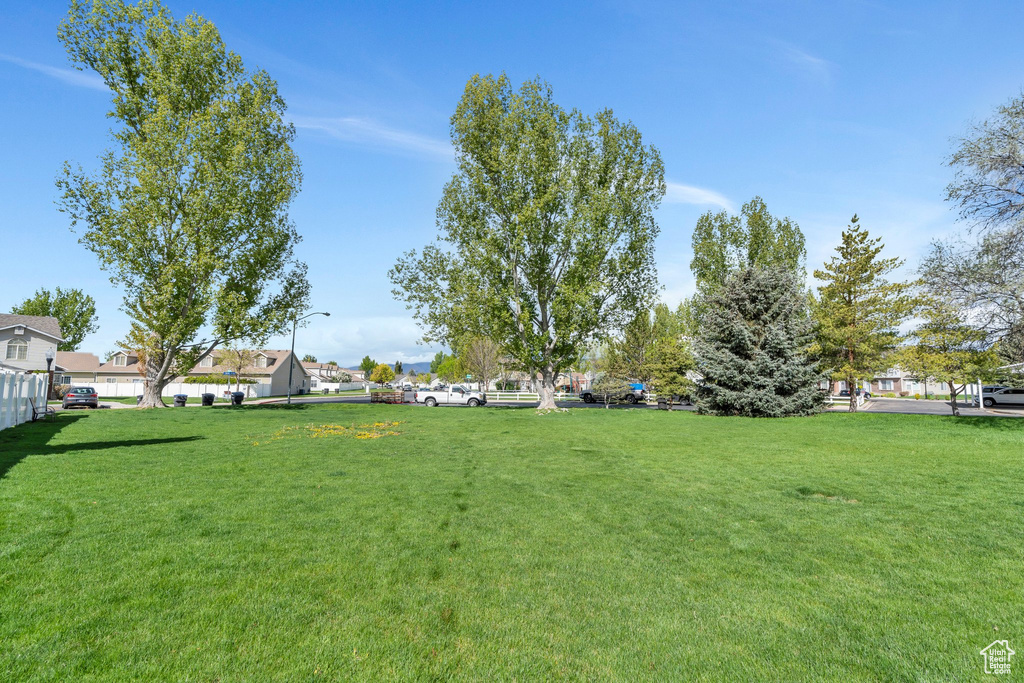 View of yard featuring fence