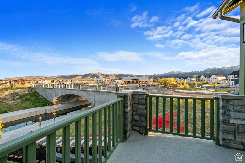 Balcony with a residential view and a mountain view