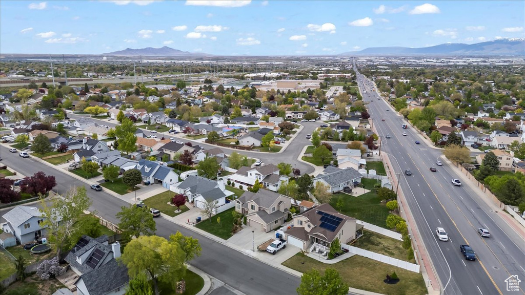 Drone / aerial view featuring a mountain view and a residential view
