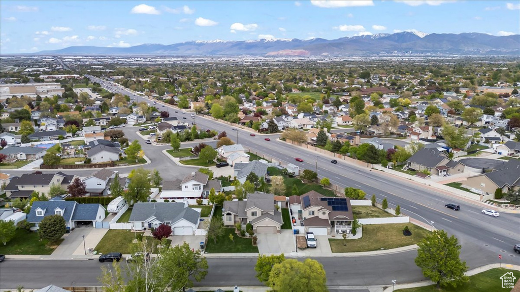 Birds eye view of property featuring a residential view and a mountain view