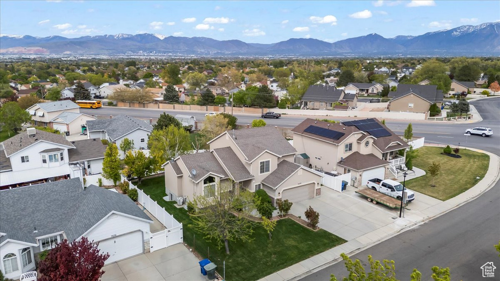 Birds eye view of property featuring a residential view and a mountain view