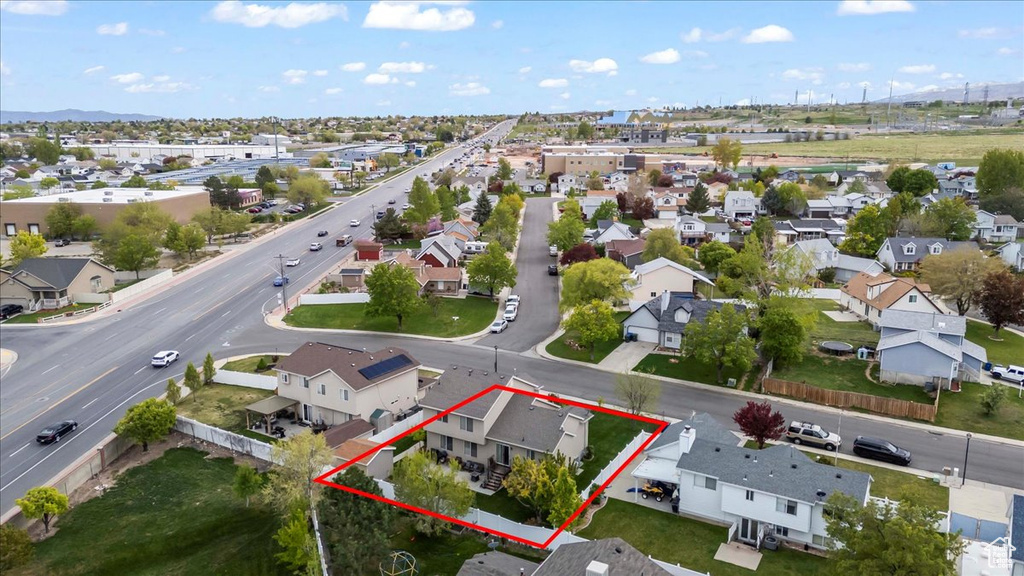 Birds eye view of property with a residential view