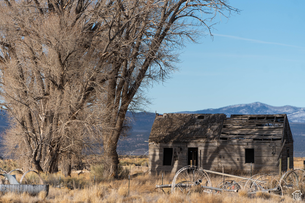 View of outbuilding featuring a mountain view