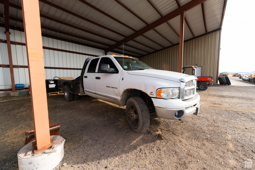 Garage featuring metal wall