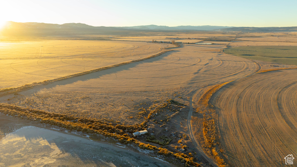 Drone / aerial view with a mountain view and a rural view