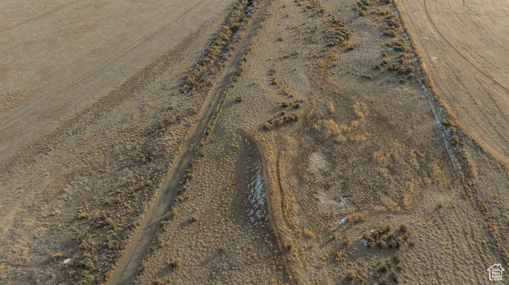 Birds eye view of property featuring a rural view
