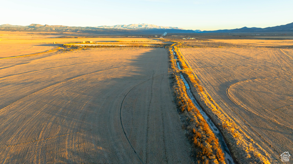 Birds eye view of property with a mountain view