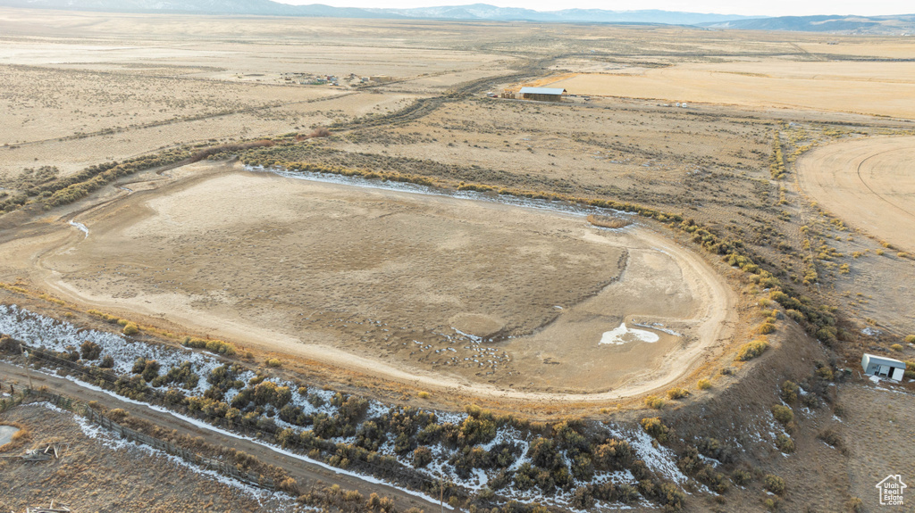 Bird's eye view with view of desert, a mountain view, and a rural view