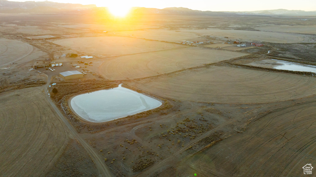 Birds eye view of property featuring a mountain view and a rural view