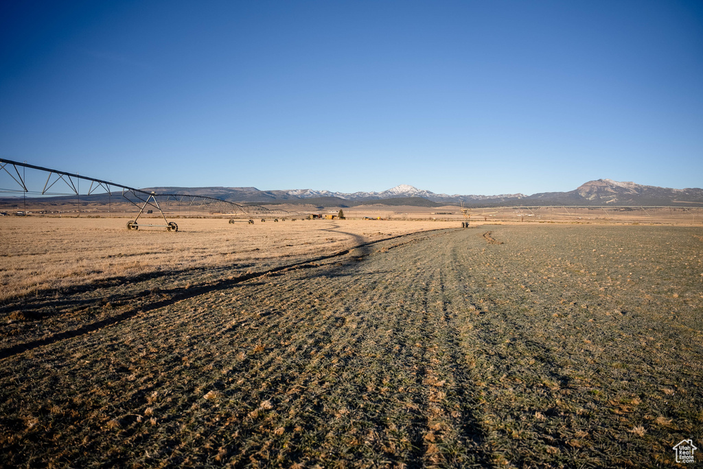 Property view of mountains featuring a rural view