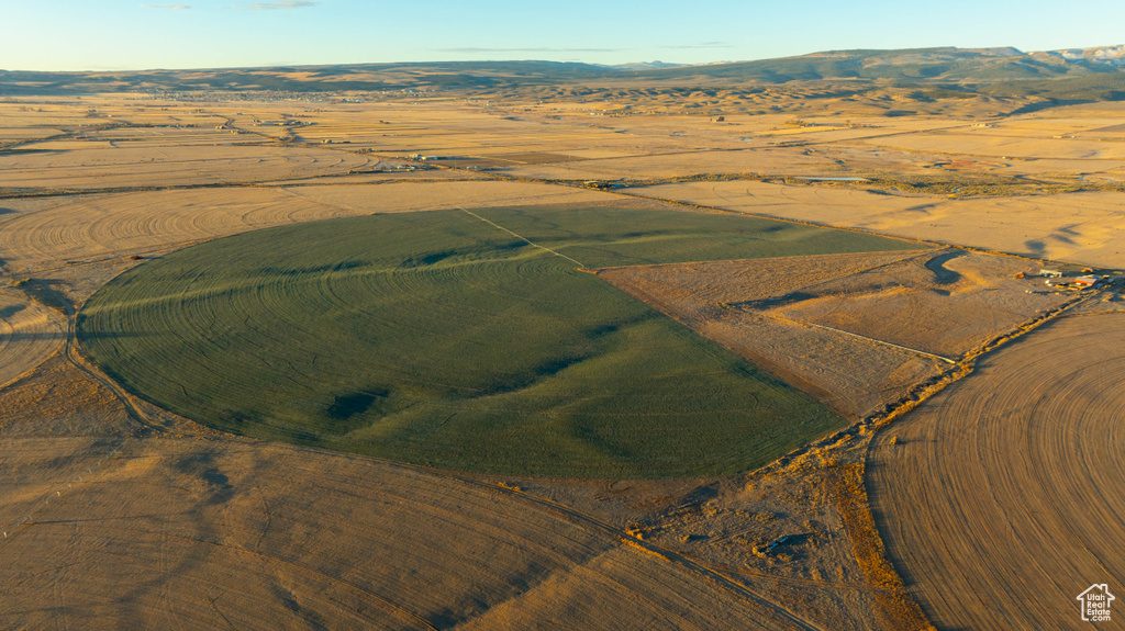 Aerial view featuring a rural view and a mountain view
