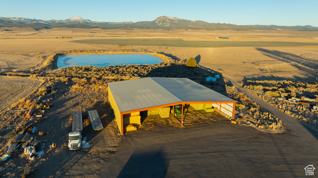 Bird's eye view with a rural view and a water and mountain view