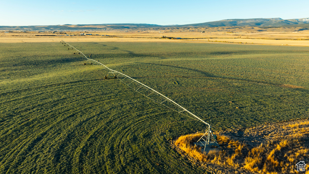Birds eye view of property with a mountain view and a rural view