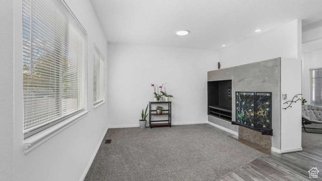 Interior space featuring recessed lighting, baseboards, visible vents, and wood finished floors