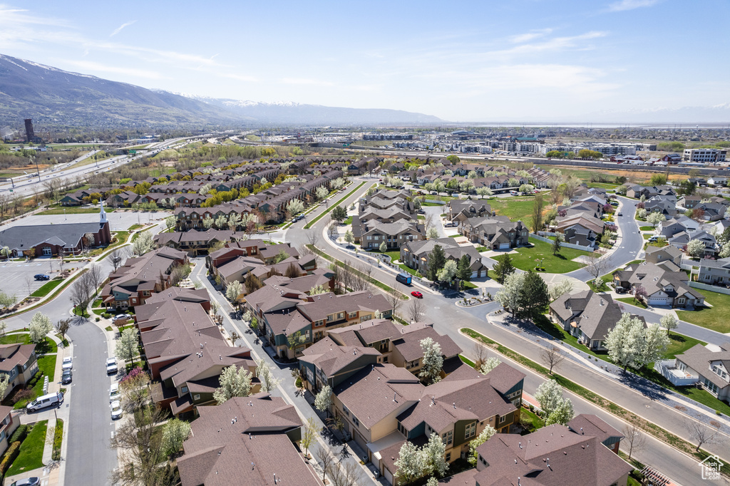 Drone / aerial view with a residential view and a mountain view