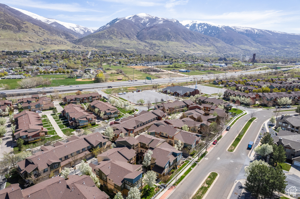 Birds eye view of property featuring a mountain view and a residential view