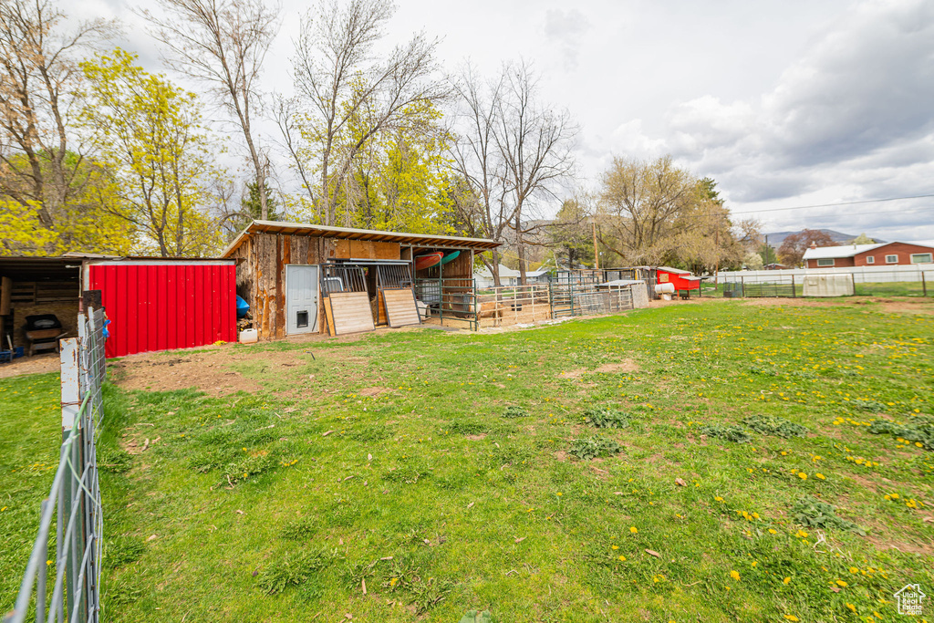 View of yard with an outbuilding and an exterior structure
