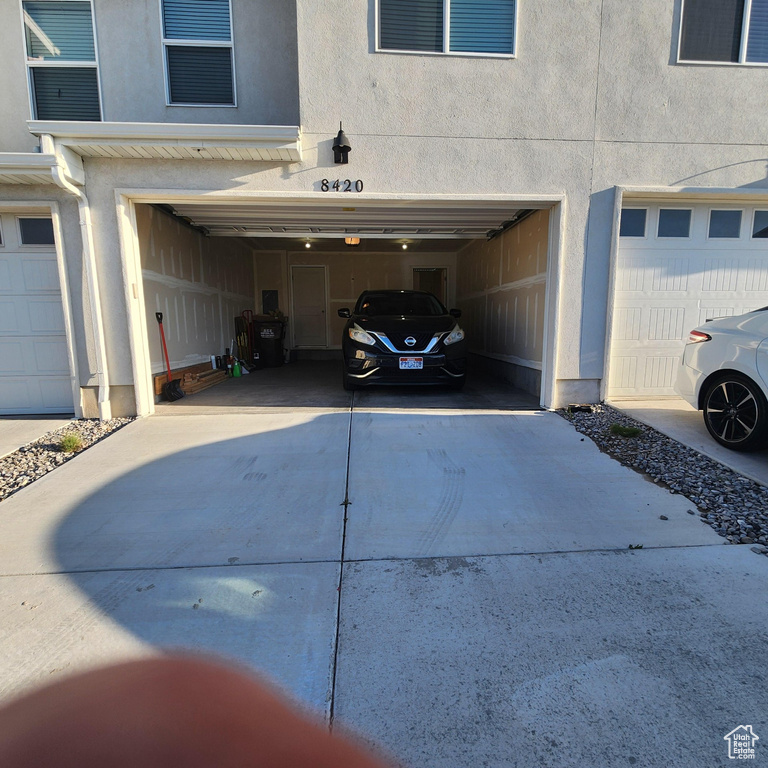 Garage featuring driveway