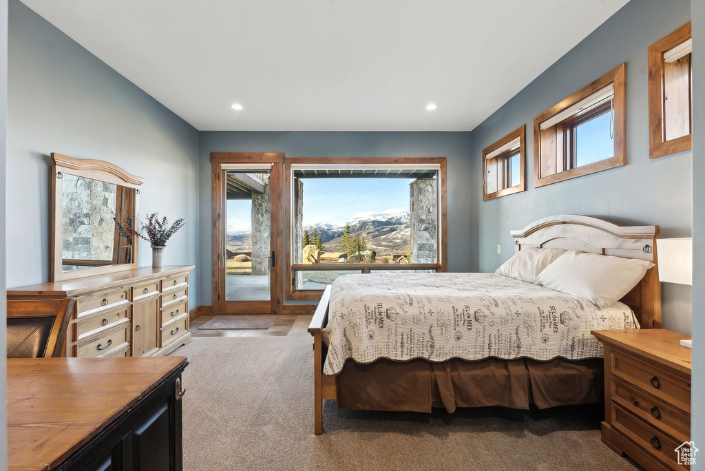 Bedroom featuring recessed lighting, access to outside, and carpet floors