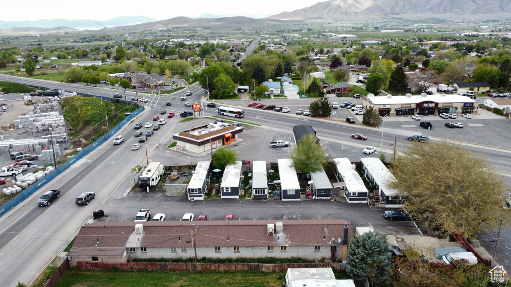 Birds eye view of property featuring a mountain view