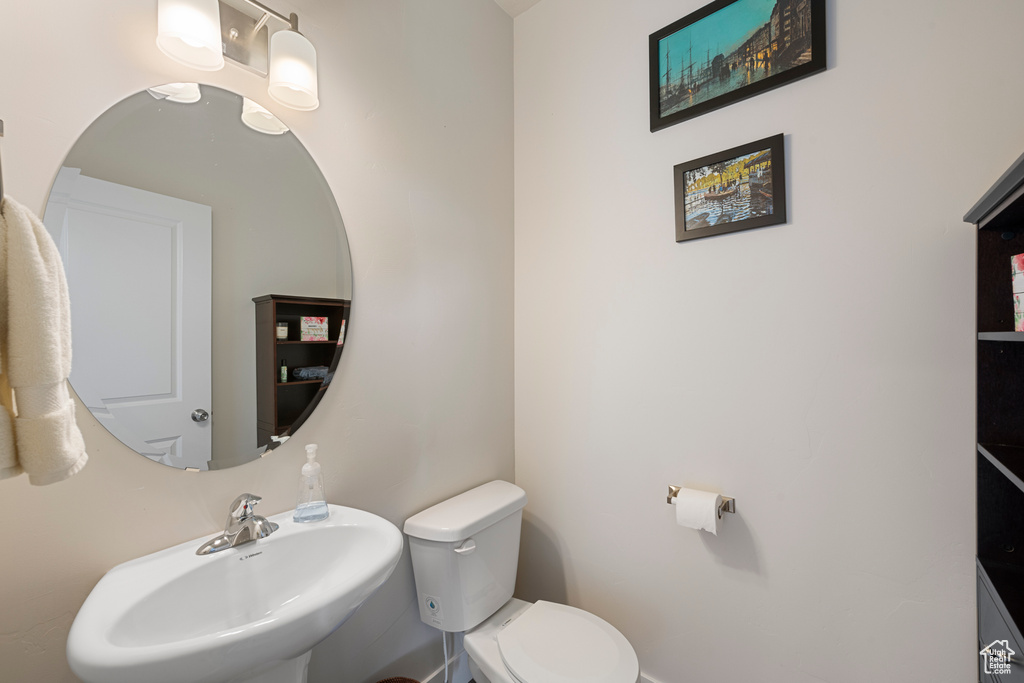Bathroom with a sink and toilet
