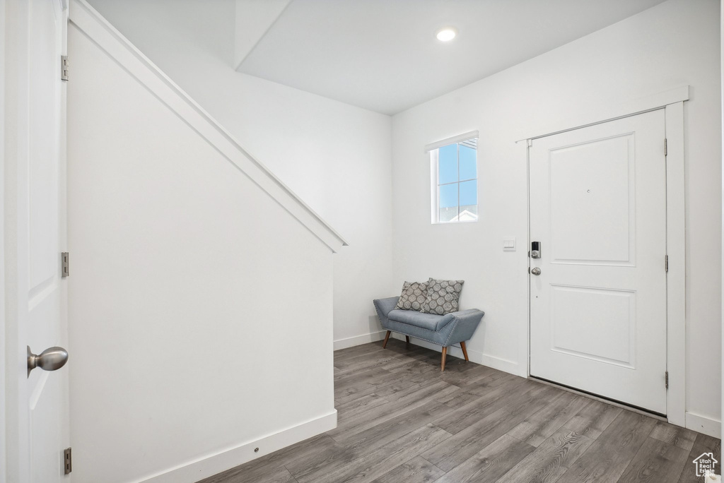 Foyer entrance featuring recessed lighting, baseboards, and wood finished floors
