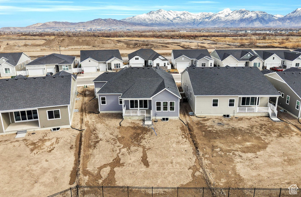 Aerial view featuring a residential view and a mountain view